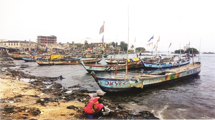 Canoes on the shores of the beach in Cape coast